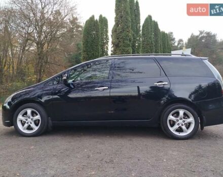 Черный Мицубиси Грандис, объемом двигателя 2.38 л и пробегом 215 тыс. км за 5900 $, фото 2 на Automoto.ua