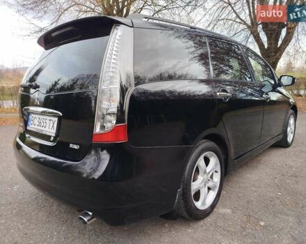 Черный Мицубиси Грандис, объемом двигателя 2.38 л и пробегом 215 тыс. км за 5900 $, фото 6 на Automoto.ua