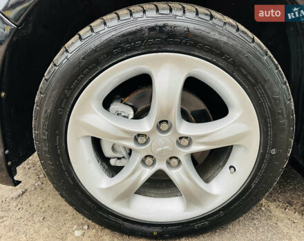 Черный Мицубиси Грандис, объемом двигателя 2.4 л и пробегом 188 тыс. км за 6800 $, фото 22 на Automoto.ua