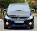 Черный Мицубиси Грандис, объемом двигателя 2.4 л и пробегом 323 тыс. км за 5999 $, фото 1 на Automoto.ua