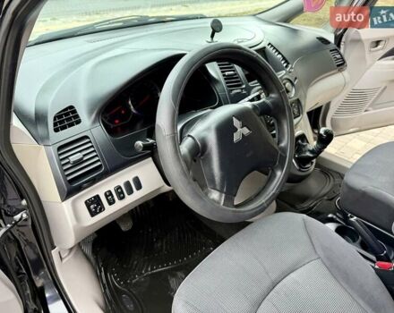 Черный Мицубиси Грандис, объемом двигателя 2.4 л и пробегом 323 тыс. км за 5999 $, фото 37 на Automoto.ua