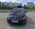 Черный Мицубиси Грандис, объемом двигателя 2.38 л и пробегом 238 тыс. км за 6499 $, фото 1 на Automoto.ua