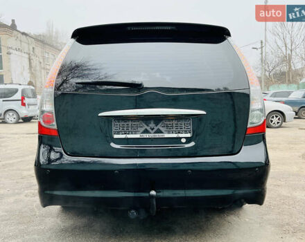 Черный Мицубиси Грандис, объемом двигателя 2.4 л и пробегом 188 тыс. км за 6800 $, фото 6 на Automoto.ua