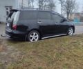 Черный Мицубиси Грандис, объемом двигателя 2.4 л и пробегом 260 тыс. км за 5990 $, фото 1 на Automoto.ua