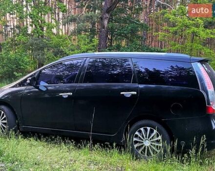 Черный Мицубиси Грандис, объемом двигателя 2.4 л и пробегом 209 тыс. км за 5500 $, фото 1 на Automoto.ua