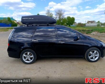 Черный Мицубиси Грандис, объемом двигателя 2.4 л и пробегом 241 тыс. км за 5400 $, фото 2 на Automoto.ua