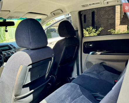 Черный Мицубиси Грандис, объемом двигателя 2.4 л и пробегом 121 тыс. км за 6450 $, фото 58 на Automoto.ua