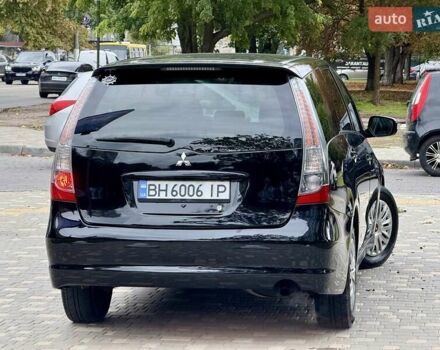 Черный Мицубиси Грандис, объемом двигателя 2.4 л и пробегом 323 тыс. км за 5999 $, фото 17 на Automoto.ua