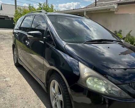 Черный Мицубиси Грандис, объемом двигателя 2.38 л и пробегом 318 тыс. км за 6500 $, фото 6 на Automoto.ua