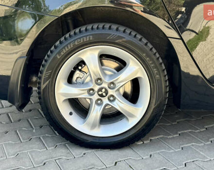 Черный Мицубиси Грандис, объемом двигателя 2.4 л и пробегом 121 тыс. км за 6450 $, фото 18 на Automoto.ua