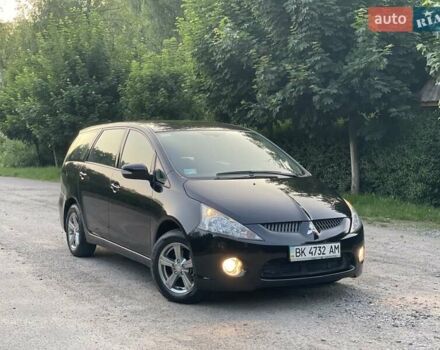 Черный Мицубиси Грандис, объемом двигателя 2.4 л и пробегом 49 тыс. км за 9250 $, фото 108 на Automoto.ua