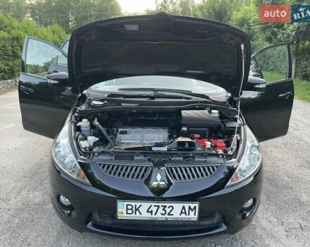 Черный Мицубиси Грандис, объемом двигателя 2.4 л и пробегом 49 тыс. км за 9250 $, фото 121 на Automoto.ua