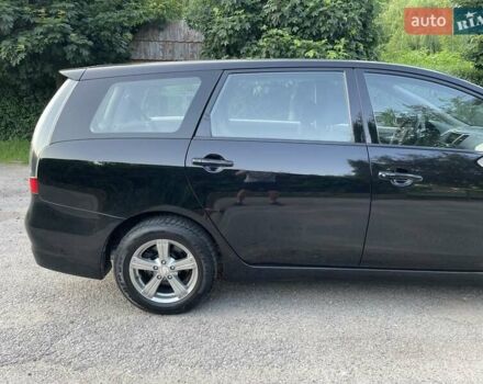 Черный Мицубиси Грандис, объемом двигателя 2.4 л и пробегом 49 тыс. км за 9250 $, фото 62 на Automoto.ua