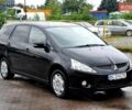 Черный Мицубиси Грандис, объемом двигателя 2.4 л и пробегом 132 тыс. км за 7900 $, фото 1 на Automoto.ua