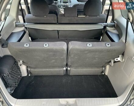 Черный Мицубиси Грандис, объемом двигателя 2.4 л и пробегом 49 тыс. км за 9250 $, фото 147 на Automoto.ua