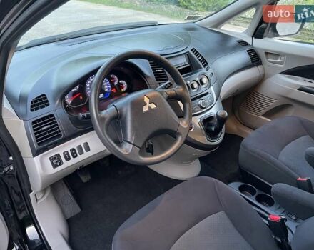 Черный Мицубиси Грандис, объемом двигателя 2.4 л и пробегом 49 тыс. км за 9250 $, фото 161 на Automoto.ua