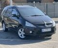 Черный Мицубиси Грандис, объемом двигателя 2.4 л и пробегом 137 тыс. км за 10700 $, фото 1 на Automoto.ua