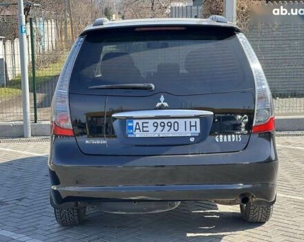 Черный Мицубиси Грандис, объемом двигателя 2.4 л и пробегом 137 тыс. км за 10700 $, фото 4 на Automoto.ua