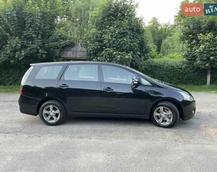 Черный Мицубиси Грандис, объемом двигателя 2.4 л и пробегом 49 тыс. км за 9250 $, фото 118 на Automoto.ua