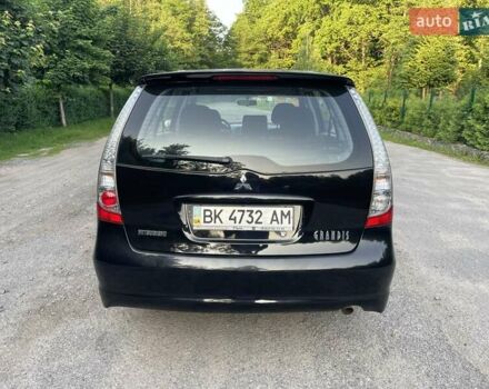 Черный Мицубиси Грандис, объемом двигателя 2.4 л и пробегом 49 тыс. км за 9250 $, фото 29 на Automoto.ua
