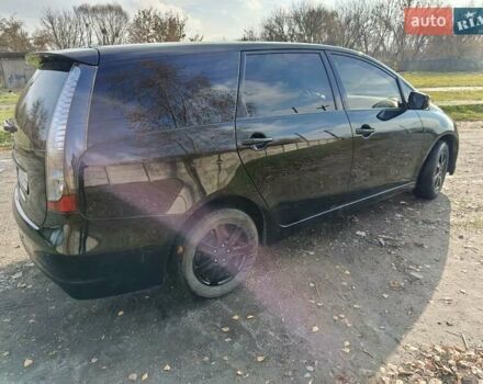 Черный Мицубиси Грандис, объемом двигателя 2 л и пробегом 249 тыс. км за 5350 $, фото 3 на Automoto.ua