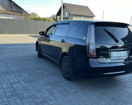 Черный Мицубиси Грандис, объемом двигателя 2.4 л и пробегом 290 тыс. км за 4600 $, фото 5 на Automoto.ua