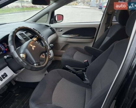 Чорний Міцубісі Грандіс, об'ємом двигуна 2.4 л та пробігом 144 тис. км за 9700 $, фото 10 на Automoto.ua
