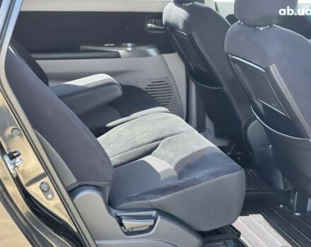 Черный Мицубиси Грандис, объемом двигателя 2.4 л и пробегом 137 тыс. км за 10700 $, фото 15 на Automoto.ua