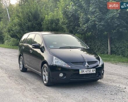 Черный Мицубиси Грандис, объемом двигателя 2.4 л и пробегом 49 тыс. км за 9250 $, фото 1 на Automoto.ua