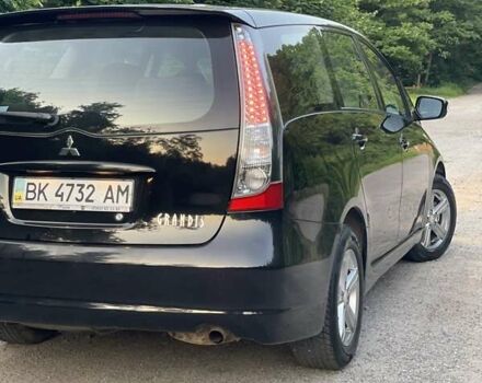 Черный Мицубиси Грандис, объемом двигателя 2.4 л и пробегом 49 тыс. км за 9250 $, фото 114 на Automoto.ua