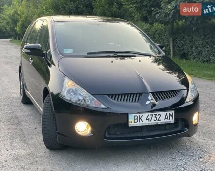 Черный Мицубиси Грандис, объемом двигателя 2.4 л и пробегом 49 тыс. км за 9250 $, фото 112 на Automoto.ua