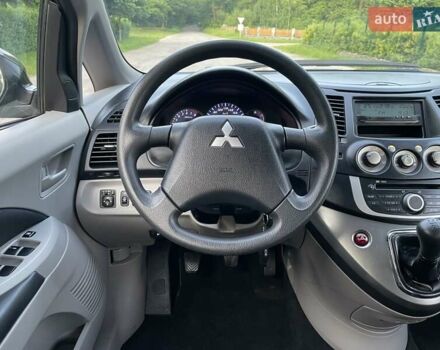 Черный Мицубиси Грандис, объемом двигателя 2.4 л и пробегом 49 тыс. км за 9250 $, фото 88 на Automoto.ua