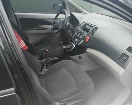 Черный Мицубиси Грандис, объемом двигателя 2.4 л и пробегом 340 тыс. км за 55000 $, фото 4 на Automoto.ua