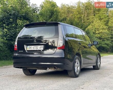 Черный Мицубиси Грандис, объемом двигателя 2.4 л и пробегом 49 тыс. км за 9250 $, фото 15 на Automoto.ua