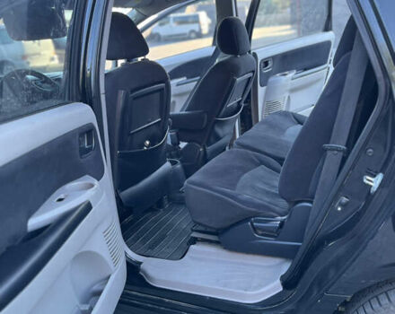 Черный Мицубиси Грандис, объемом двигателя 2.4 л и пробегом 290 тыс. км за 4600 $, фото 8 на Automoto.ua