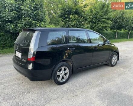 Черный Мицубиси Грандис, объемом двигателя 2.4 л и пробегом 49 тыс. км за 9250 $, фото 31 на Automoto.ua