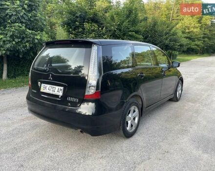 Черный Мицубиси Грандис, объемом двигателя 2.4 л и пробегом 49 тыс. км за 9250 $, фото 30 на Automoto.ua