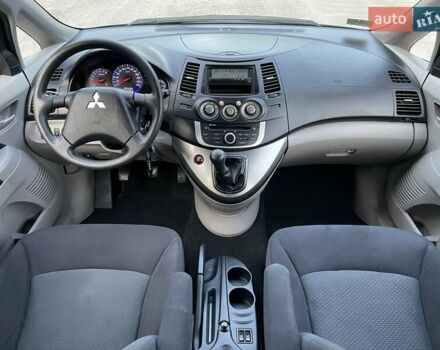 Черный Мицубиси Грандис, объемом двигателя 2.4 л и пробегом 49 тыс. км за 9250 $, фото 86 на Automoto.ua