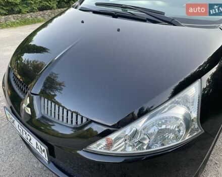 Черный Мицубиси Грандис, объемом двигателя 2.4 л и пробегом 49 тыс. км за 9250 $, фото 44 на Automoto.ua