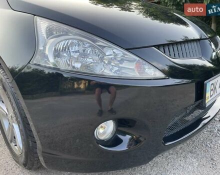 Черный Мицубиси Грандис, объемом двигателя 2.4 л и пробегом 49 тыс. км за 9250 $, фото 45 на Automoto.ua