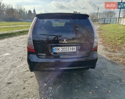Черный Мицубиси Грандис, объемом двигателя 2 л и пробегом 249 тыс. км за 5350 $, фото 2 на Automoto.ua