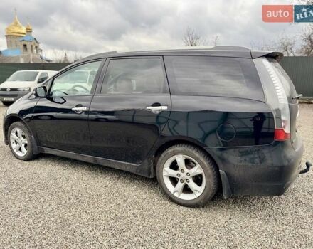 Черный Мицубиси Грандис, объемом двигателя 2.4 л и пробегом 185 тыс. км за 5899 $, фото 17 на Automoto.ua