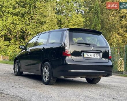 Черный Мицубиси Грандис, объемом двигателя 2.4 л и пробегом 49 тыс. км за 9250 $, фото 12 на Automoto.ua