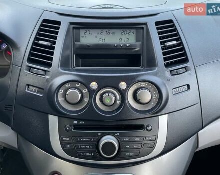 Черный Мицубиси Грандис, объемом двигателя 2.4 л и пробегом 49 тыс. км за 9250 $, фото 94 на Automoto.ua