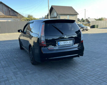 Черный Мицубиси Грандис, объемом двигателя 2.4 л и пробегом 290 тыс. км за 4600 $, фото 2 на Automoto.ua