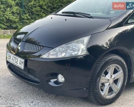 Черный Мицубиси Грандис, объемом двигателя 2.4 л и пробегом 49 тыс. км за 9250 $, фото 43 на Automoto.ua