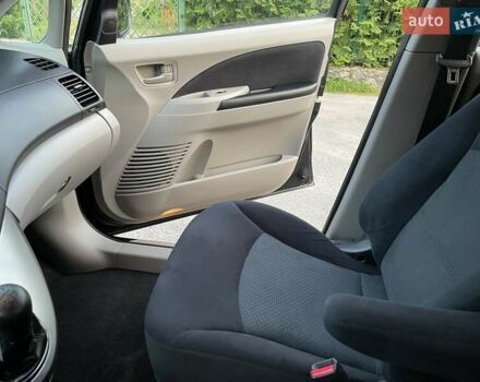 Черный Мицубиси Грандис, объемом двигателя 2.4 л и пробегом 49 тыс. км за 9250 $, фото 106 на Automoto.ua