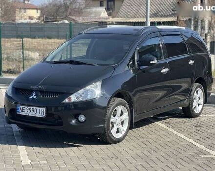 Черный Мицубиси Грандис, объемом двигателя 2.4 л и пробегом 137 тыс. км за 10700 $, фото 7 на Automoto.ua