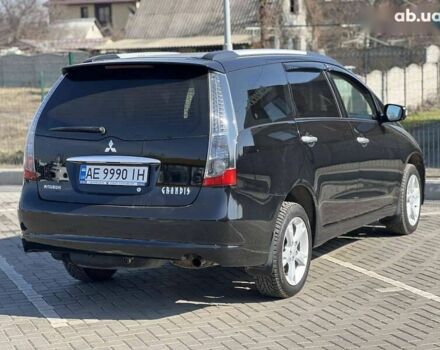 Черный Мицубиси Грандис, объемом двигателя 2.4 л и пробегом 137 тыс. км за 10700 $, фото 8 на Automoto.ua