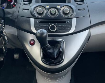 Черный Мицубиси Грандис, объемом двигателя 2.4 л и пробегом 49 тыс. км за 9250 $, фото 92 на Automoto.ua